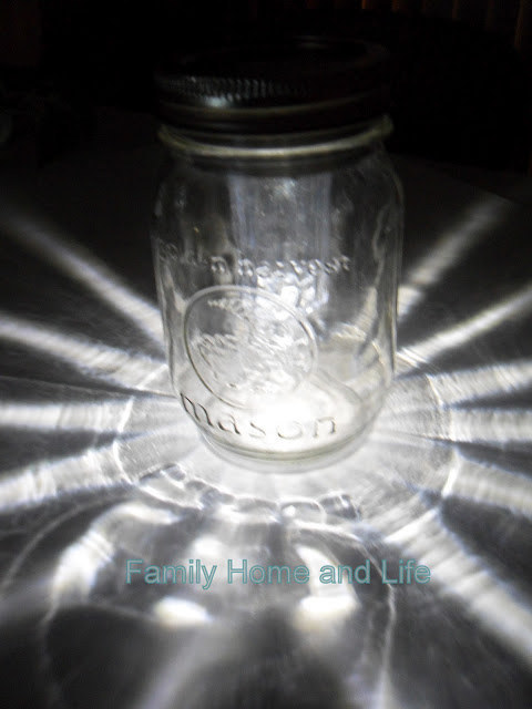 In case of a power outage, use outdoor solar lights to make mason jar "lanterns."