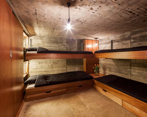 e33cc7628a3217b1a57adda96c6f4efa They Turned This World War II Bunker Into What? That’s Awesome. It's not a summer vacation if you're not sleeping stacked on top of your friends or loved ones.